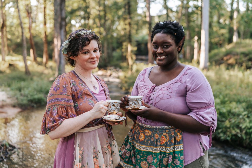 Wisteria Cafe Owners smiling with tea